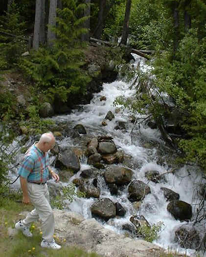 Omer pounders the waterfall.
